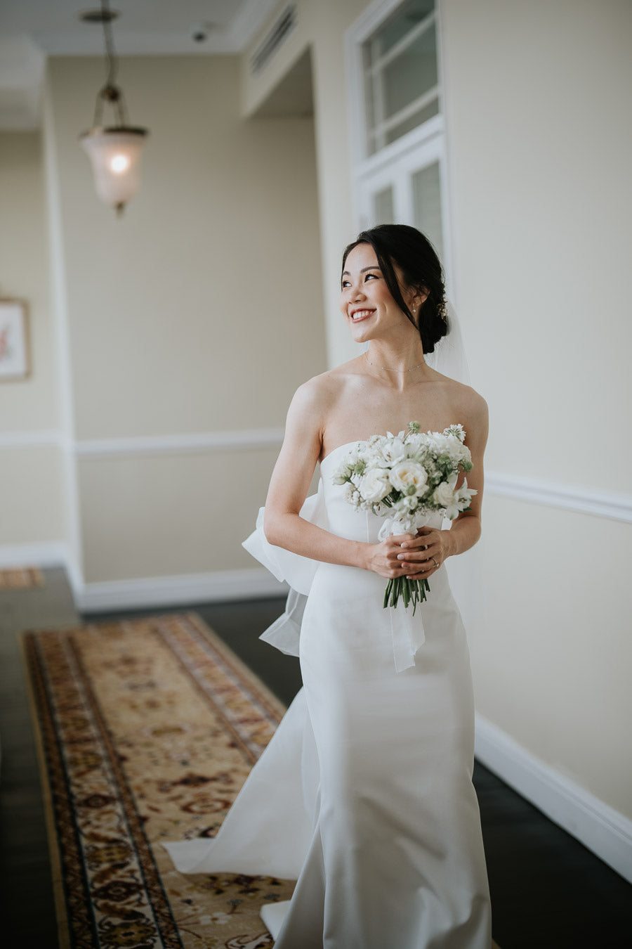 Sophisticated Simplicity: Juliet’s Clean-Cut Gown with a One-of-a-Kind Bow
