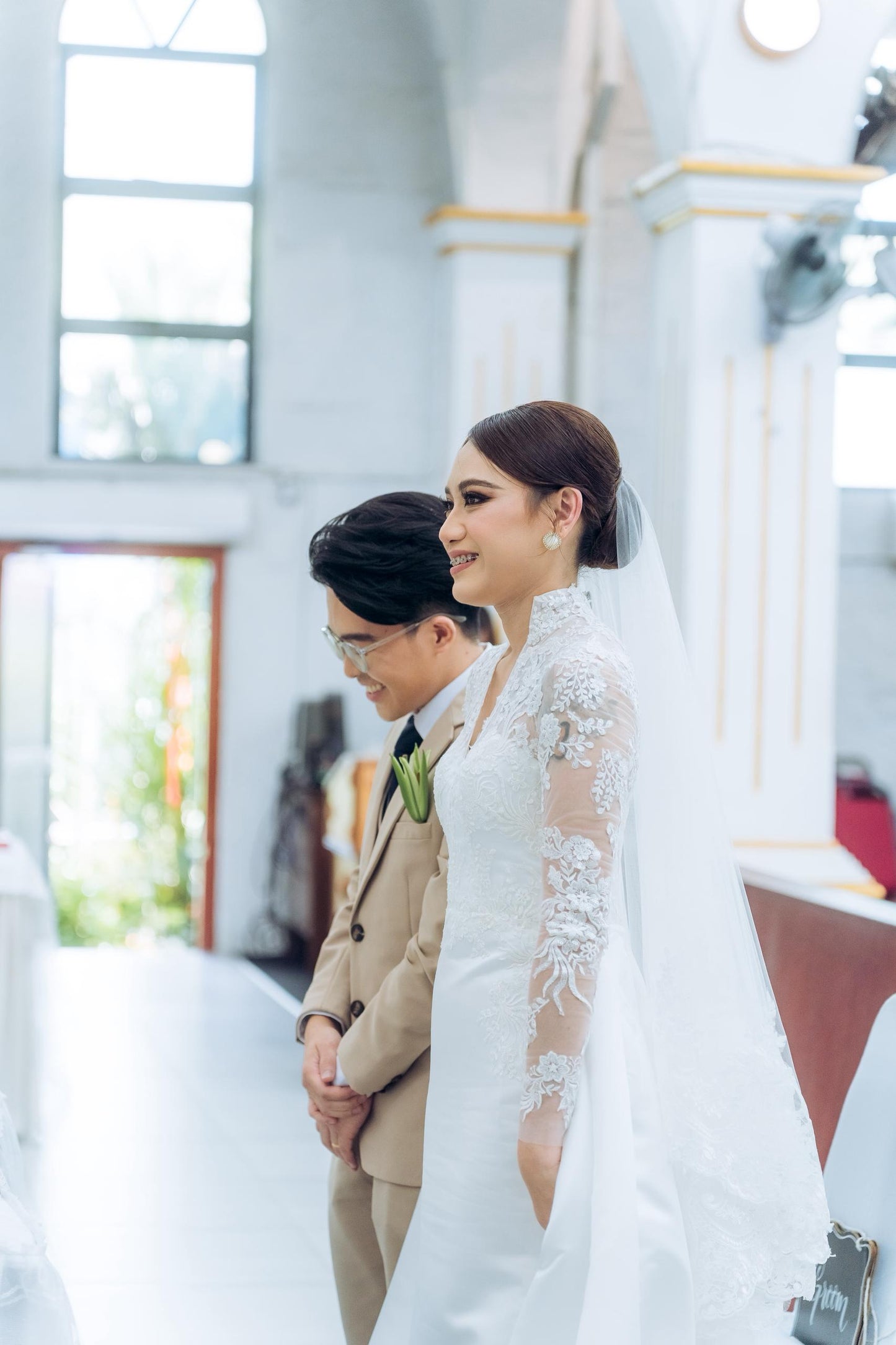 Bride Valerie’s Timeless Long-Sleeve Lace Gown