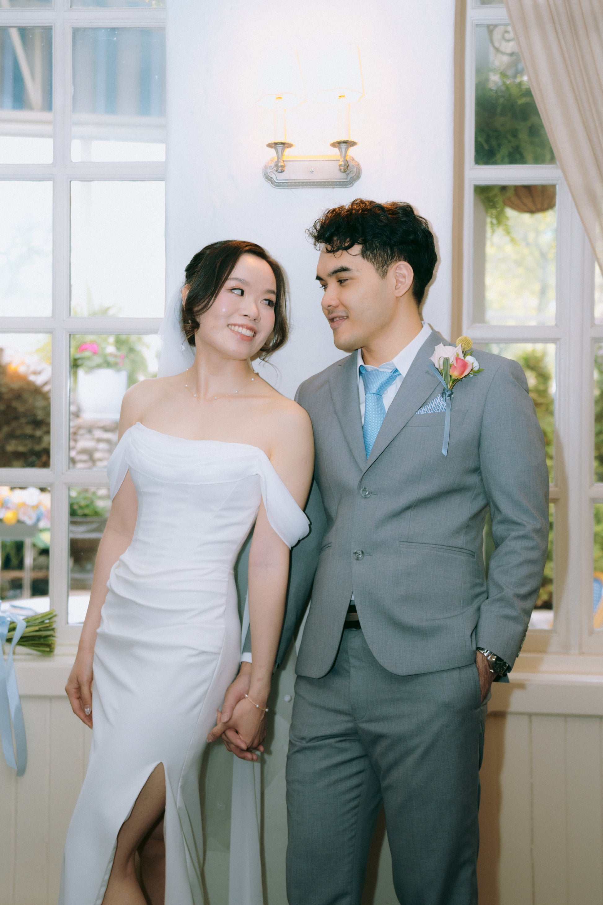 Custom wedding gown and bespoke suit by Dentelle Bridal for Bride Anna