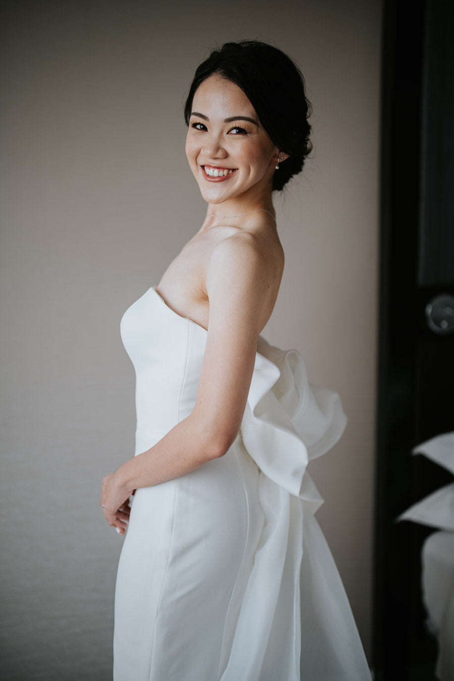 Sophisticated Simplicity: Juliet’s Clean-Cut Gown with a One-of-a-Kind Bow