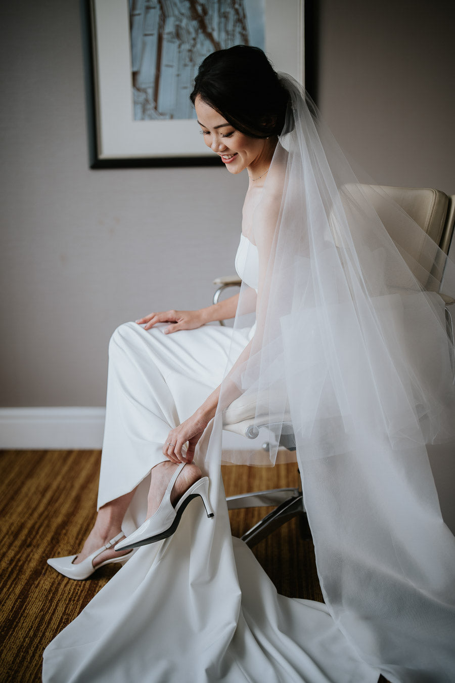 Sophisticated Simplicity: Juliet’s Clean-Cut Gown with a One-of-a-Kind Bow