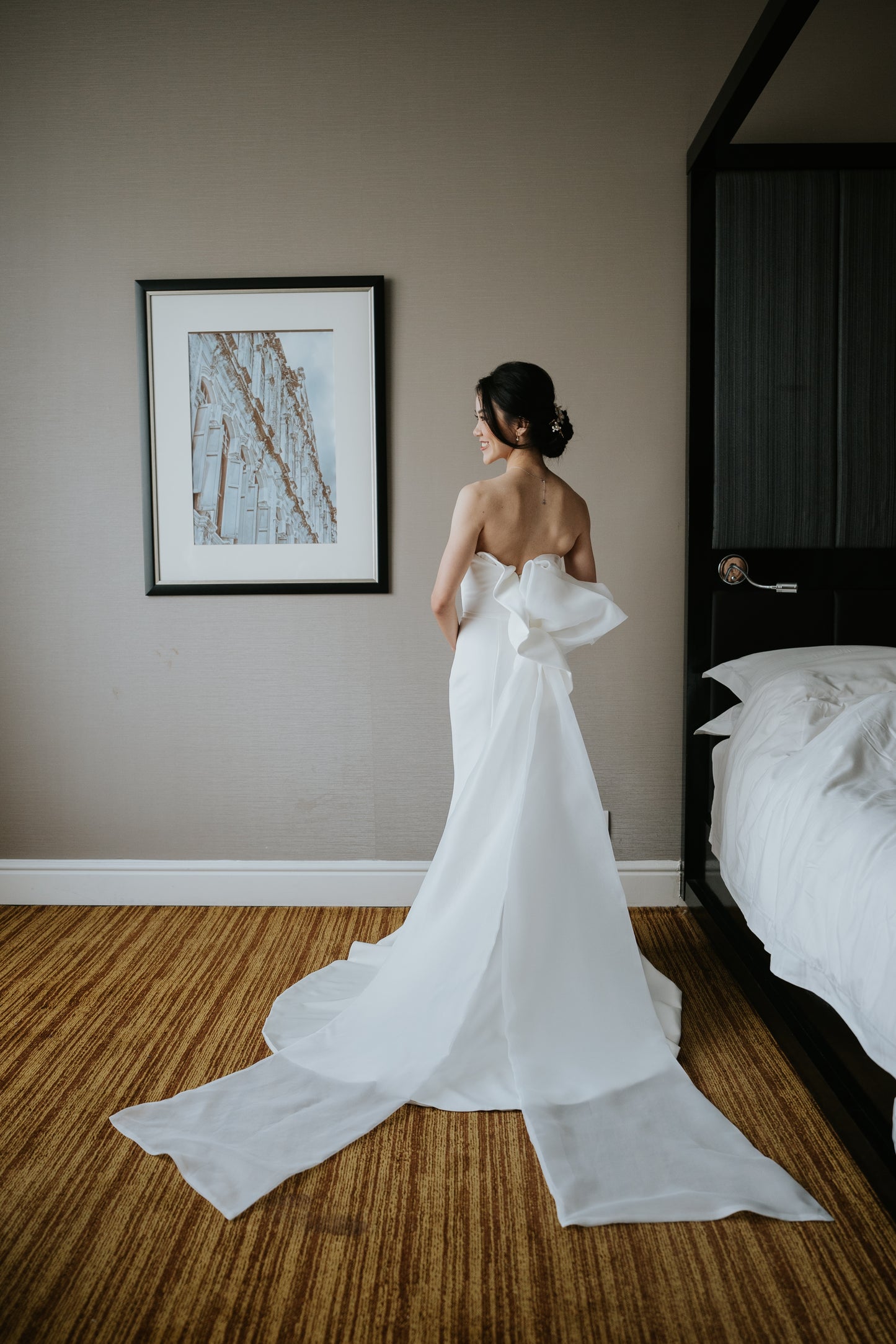 Sophisticated Simplicity: Juliet’s Clean-Cut Gown with a One-of-a-Kind Bow