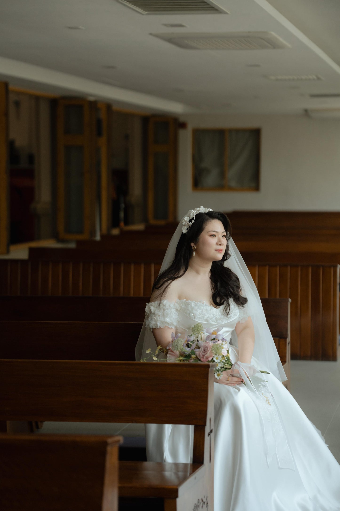 Bride Constance’s Satin Gown with Beaded Floral Details