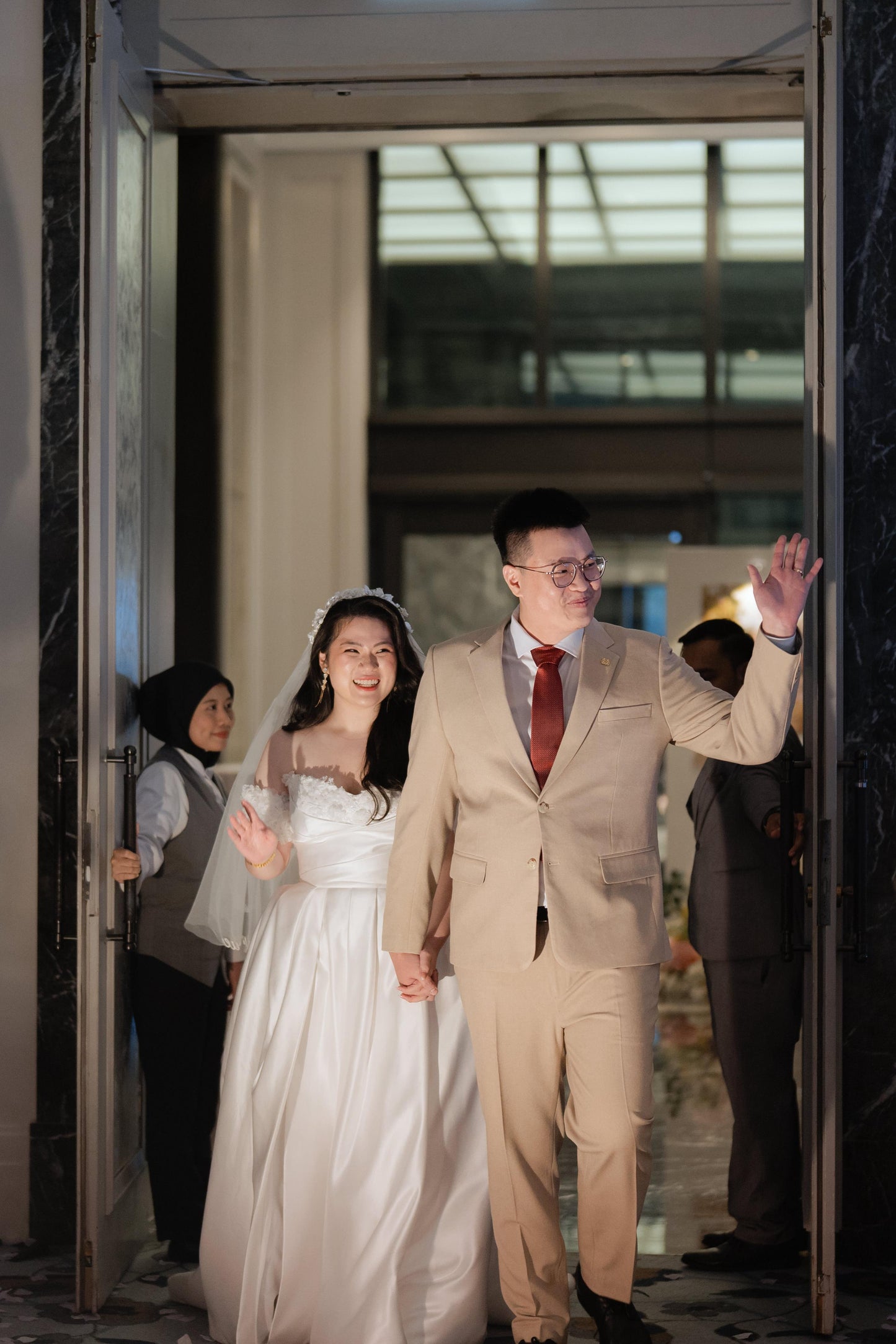 Bride Constance’s Satin Gown with Beaded Floral Details