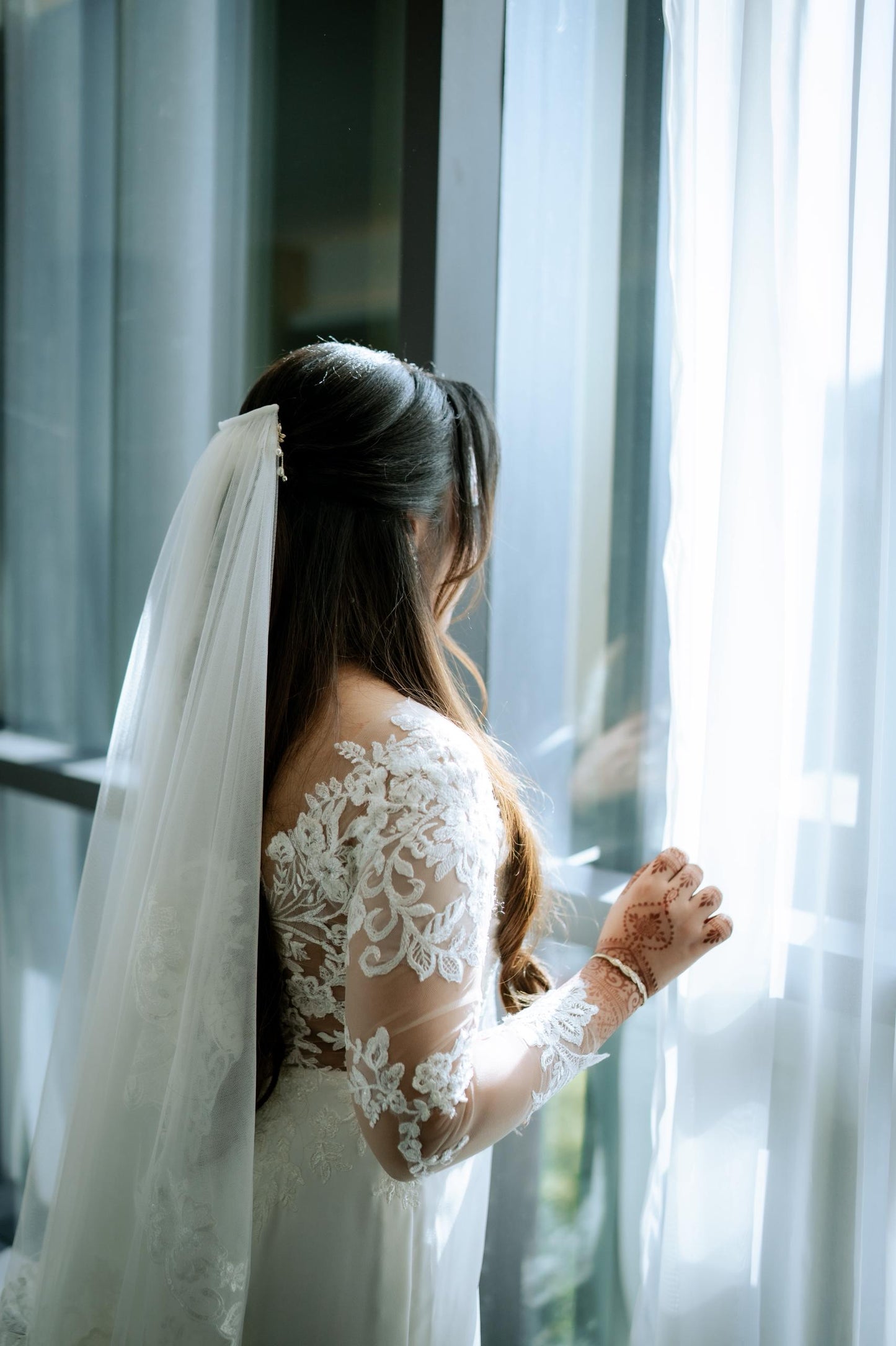 Bride Laticia in Timeless Elegance with a Statement Back