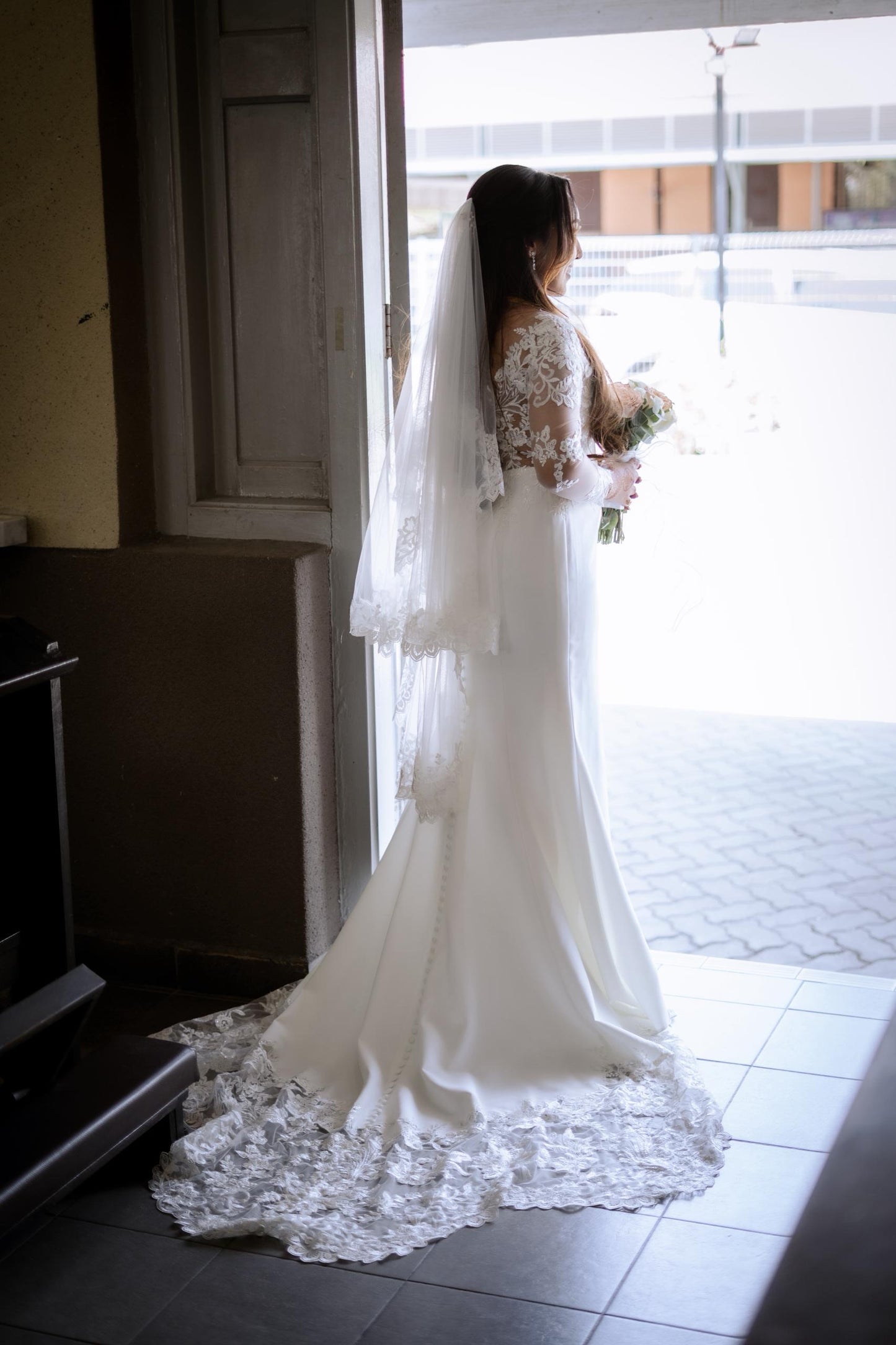 Laticia's Classic Gown with a Shaped Cut-Out Train