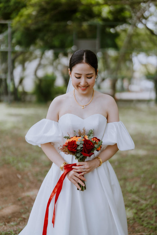 Minimalist A-line wedding gown with statement sleeves by Dentelle Bridal