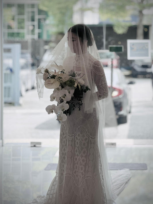Custom modest lace mermaid wedding gown by Dentelle Bridal