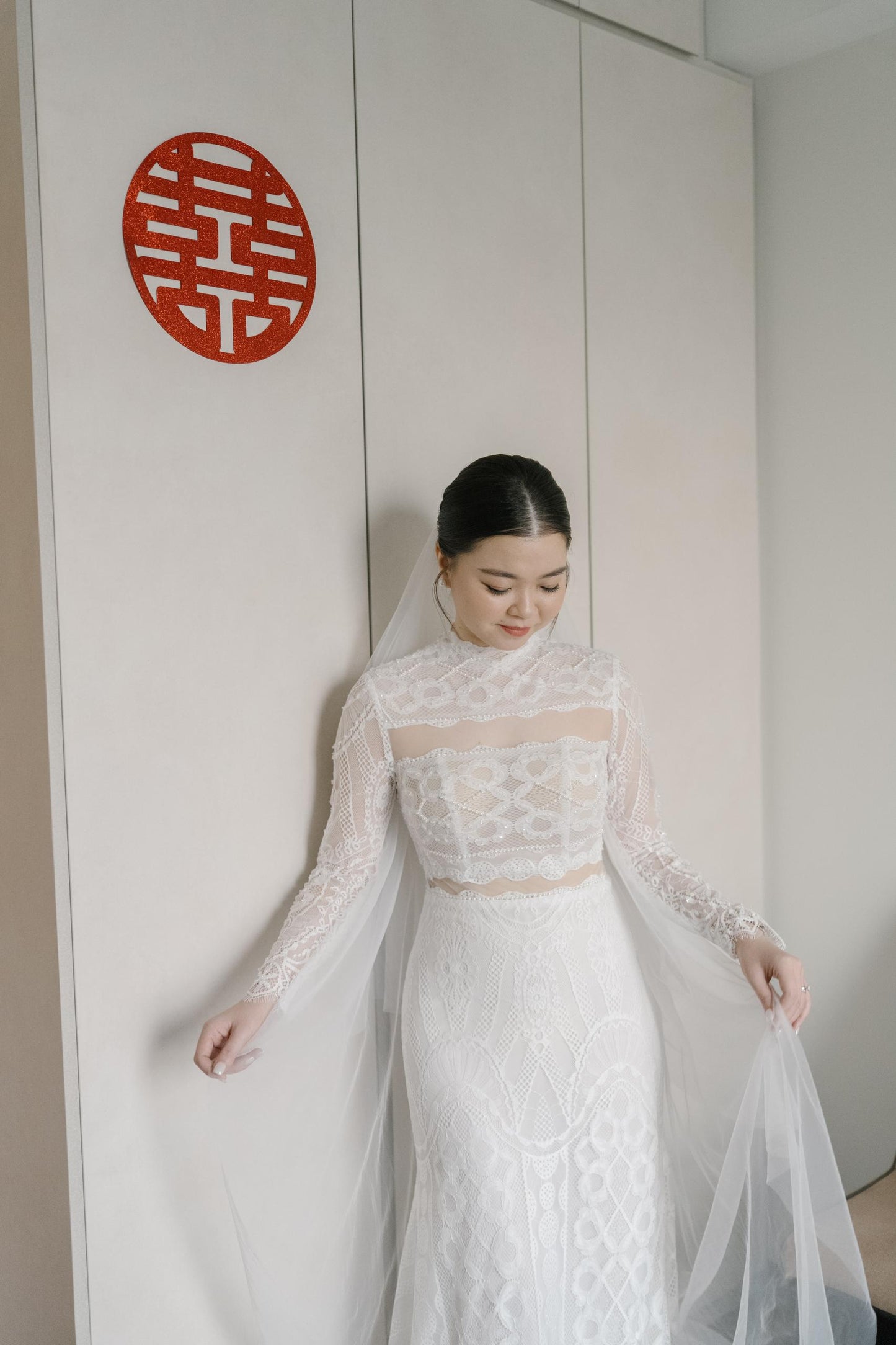Intricate lace applique details on custom wedding dress
