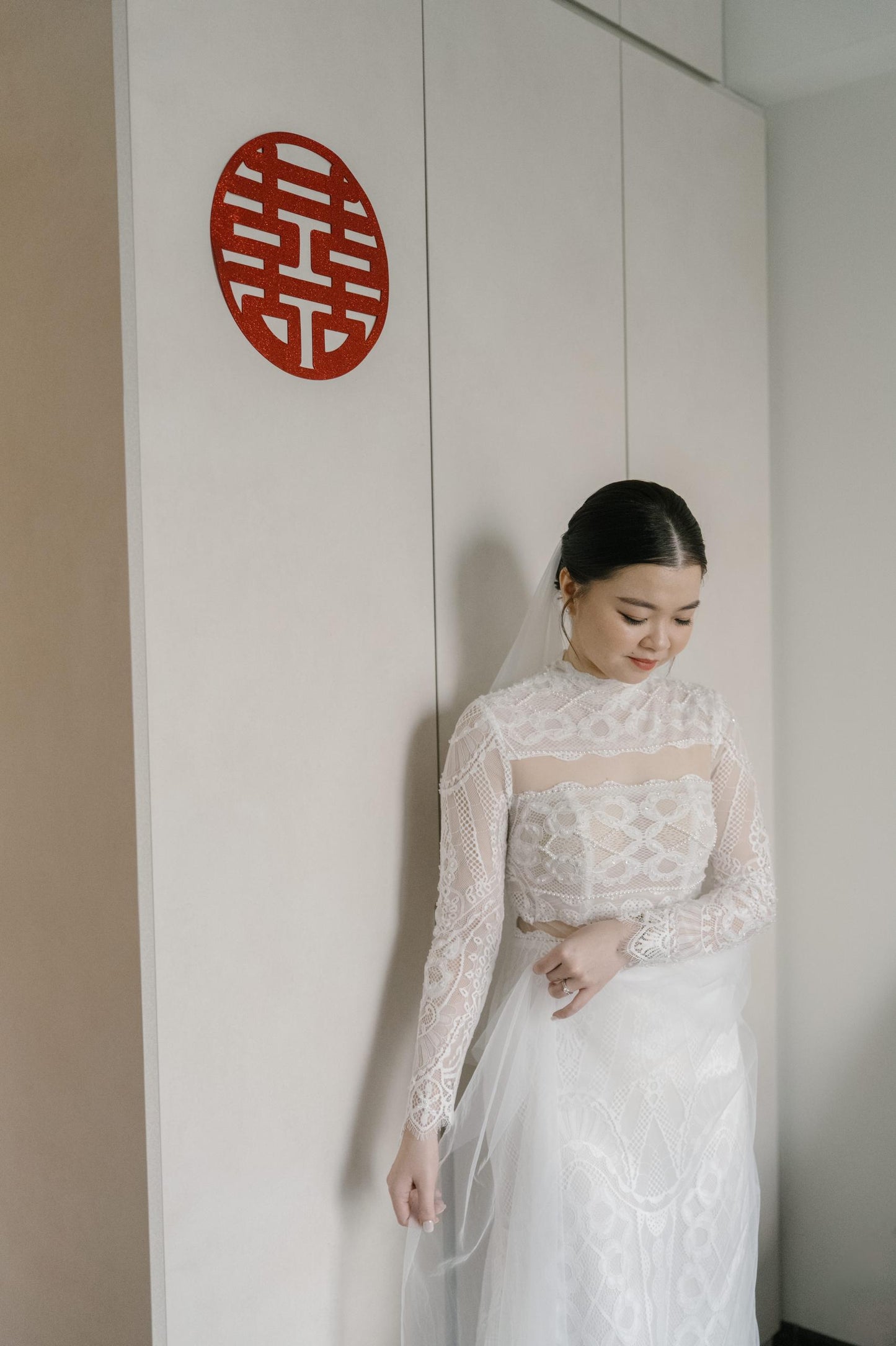 Delicate lace craftsmanship on mermaid bridal gown