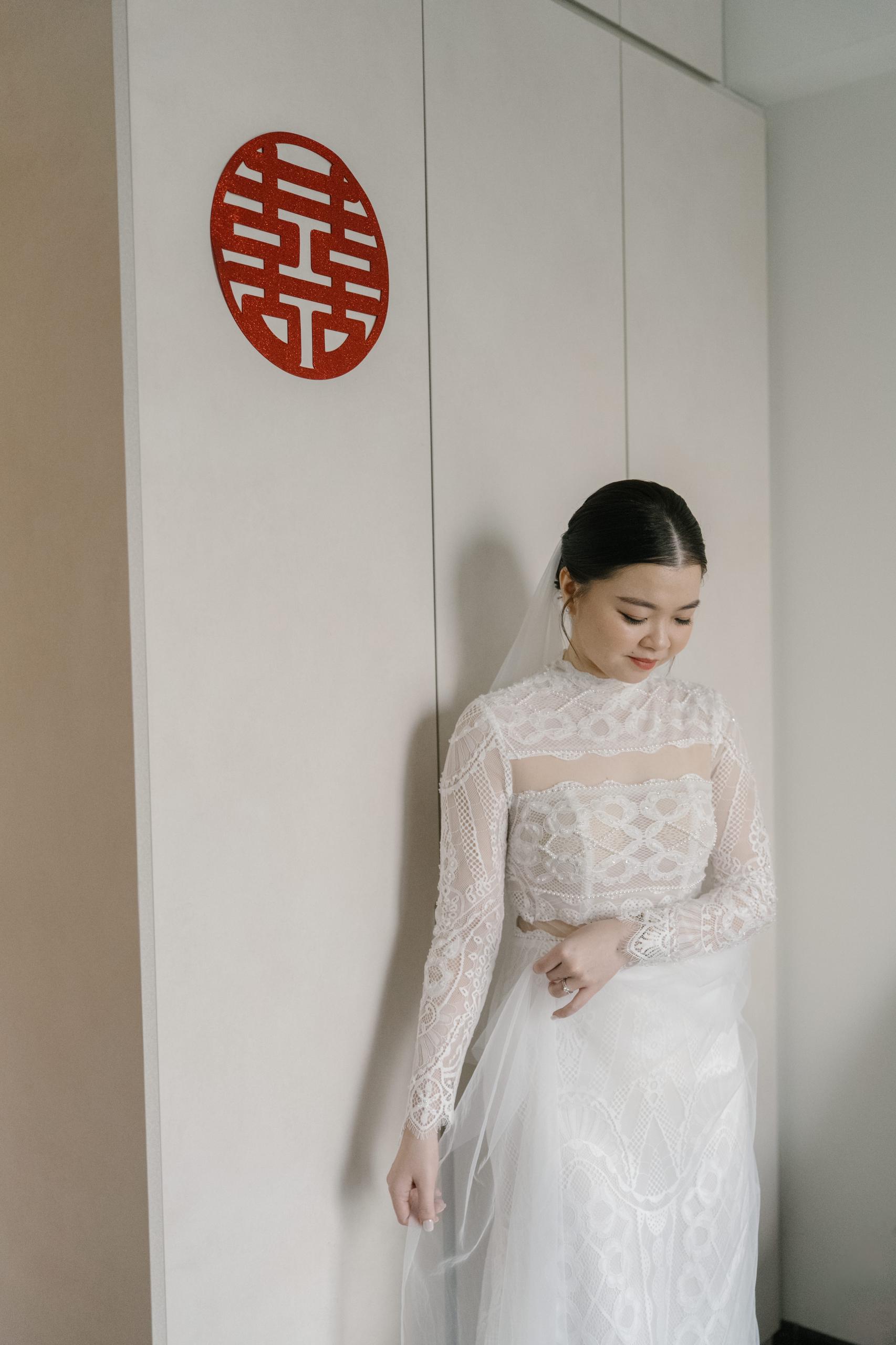 Delicate lace craftsmanship on mermaid bridal gown