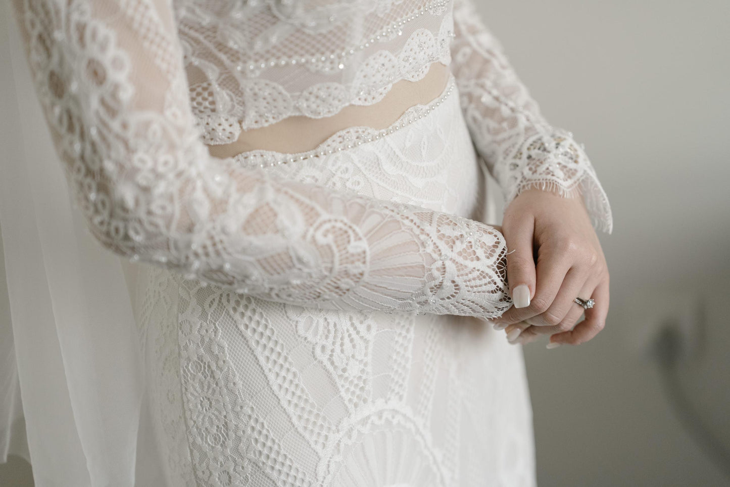 Detailed lace placement on bespoke wedding gown