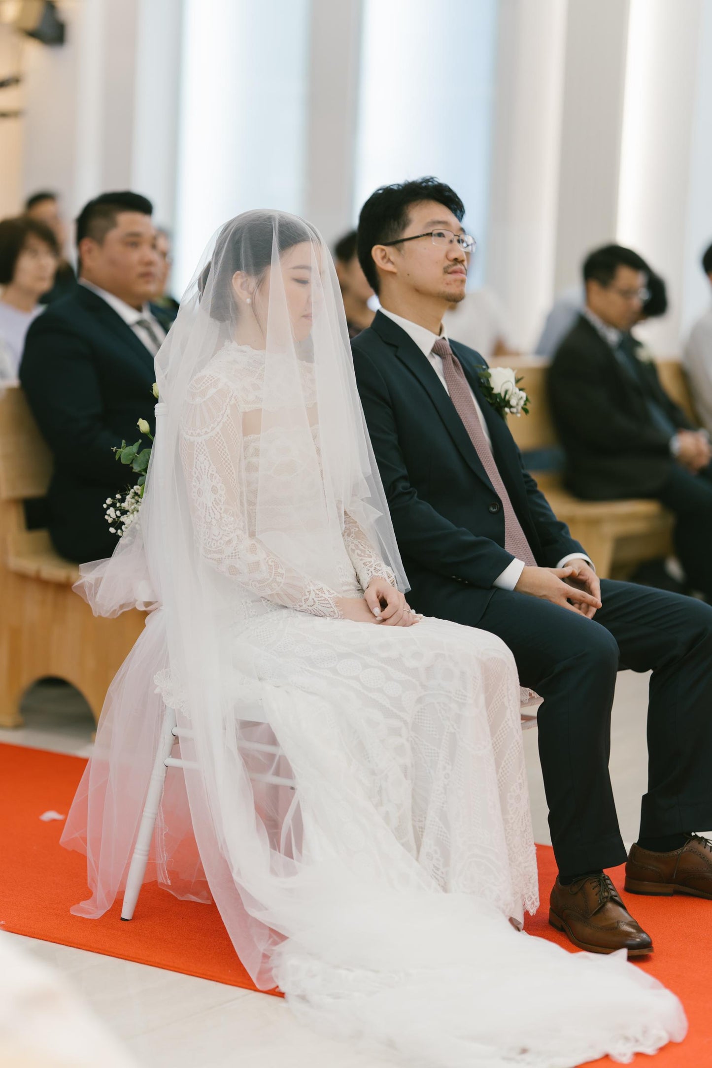 Custom lace bridal gown in elegant modest design