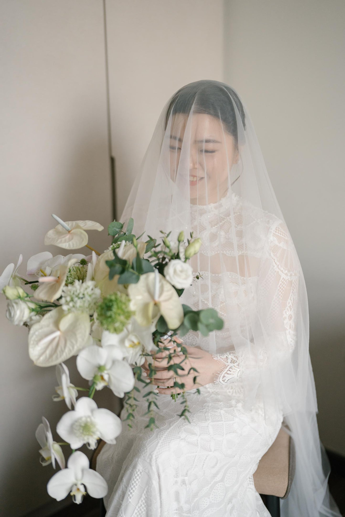 Handcrafted lace patchwork detail on couture bridal gown
