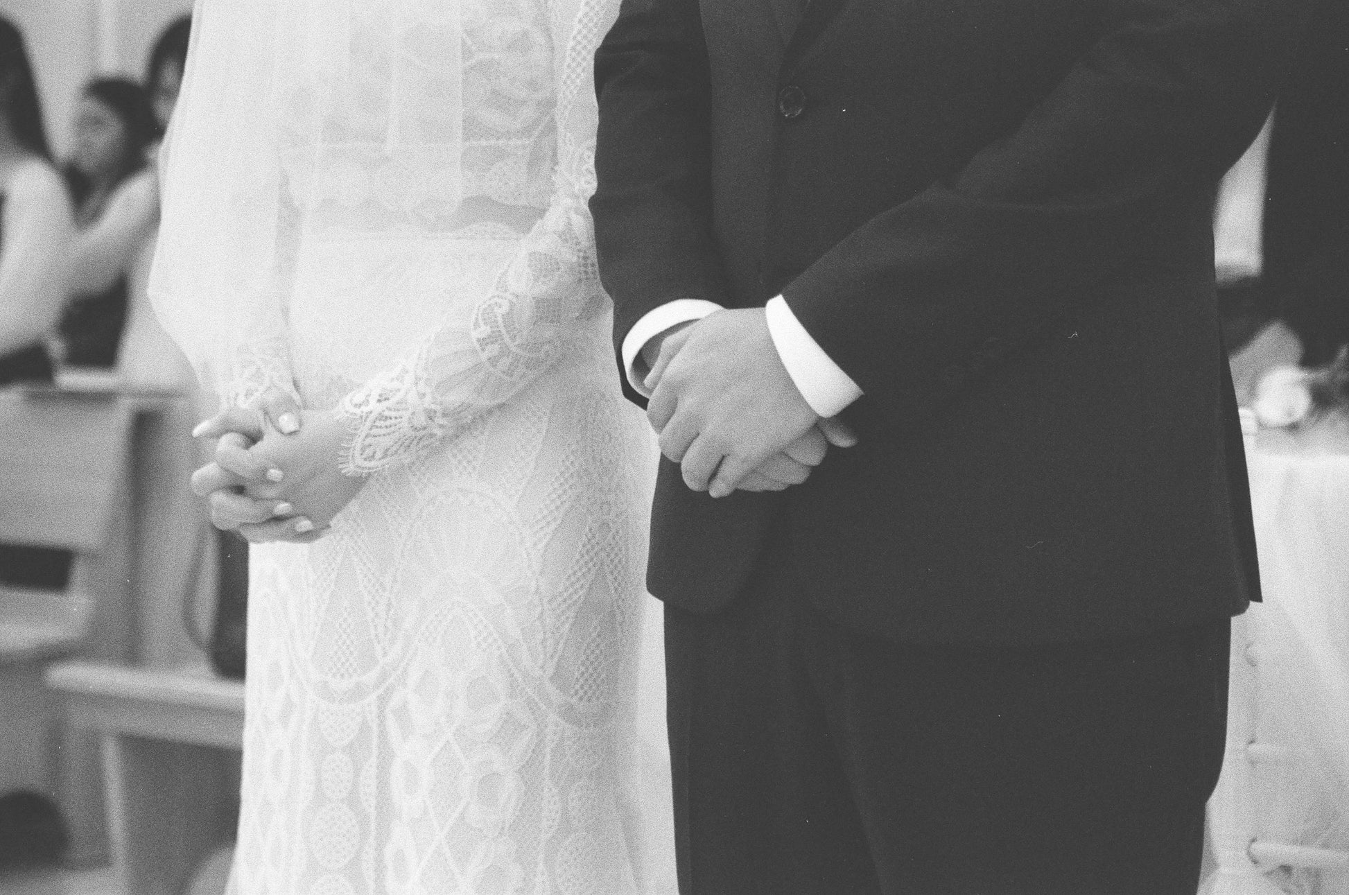 Handcrafted lace patchwork detail on couture bridal gown