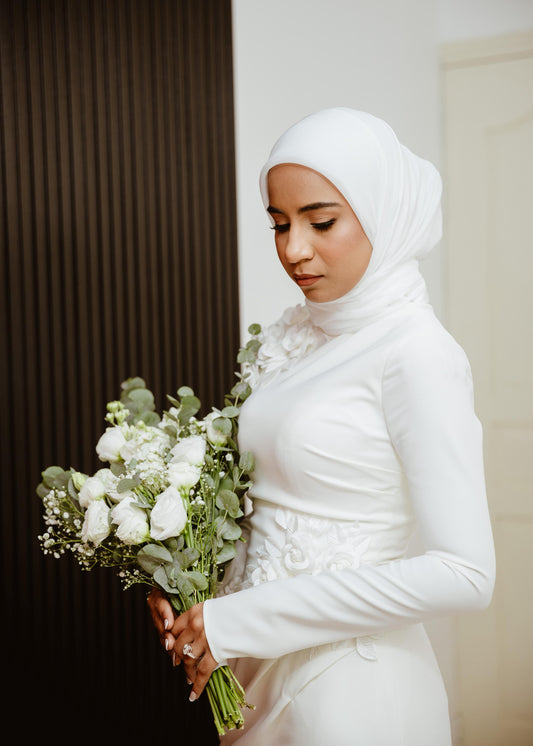 Bride Rauha — Minimalist Gown with 3D Floral Details