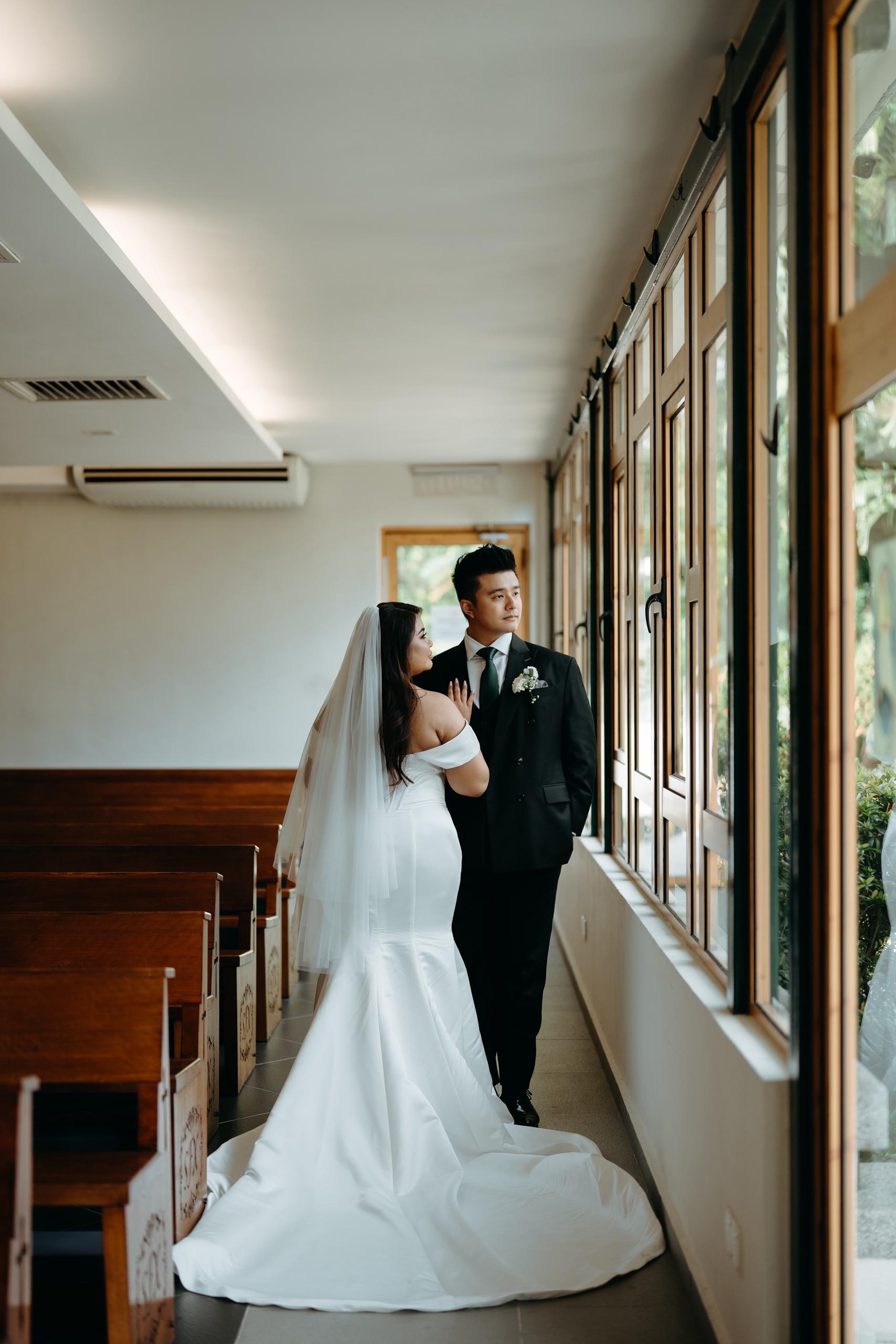 Back view of custom fitted wedding gown designed for Bride Sharon