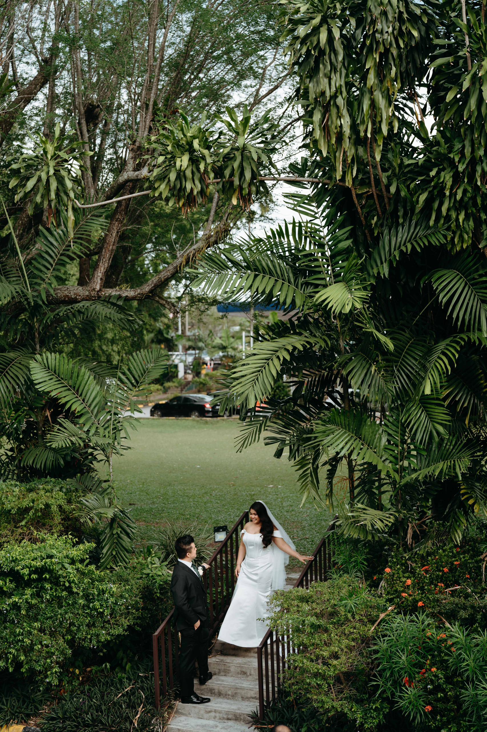 Custom corset wedding gown tailored to Bride Sharon's silhouette by Dentelle Bridal