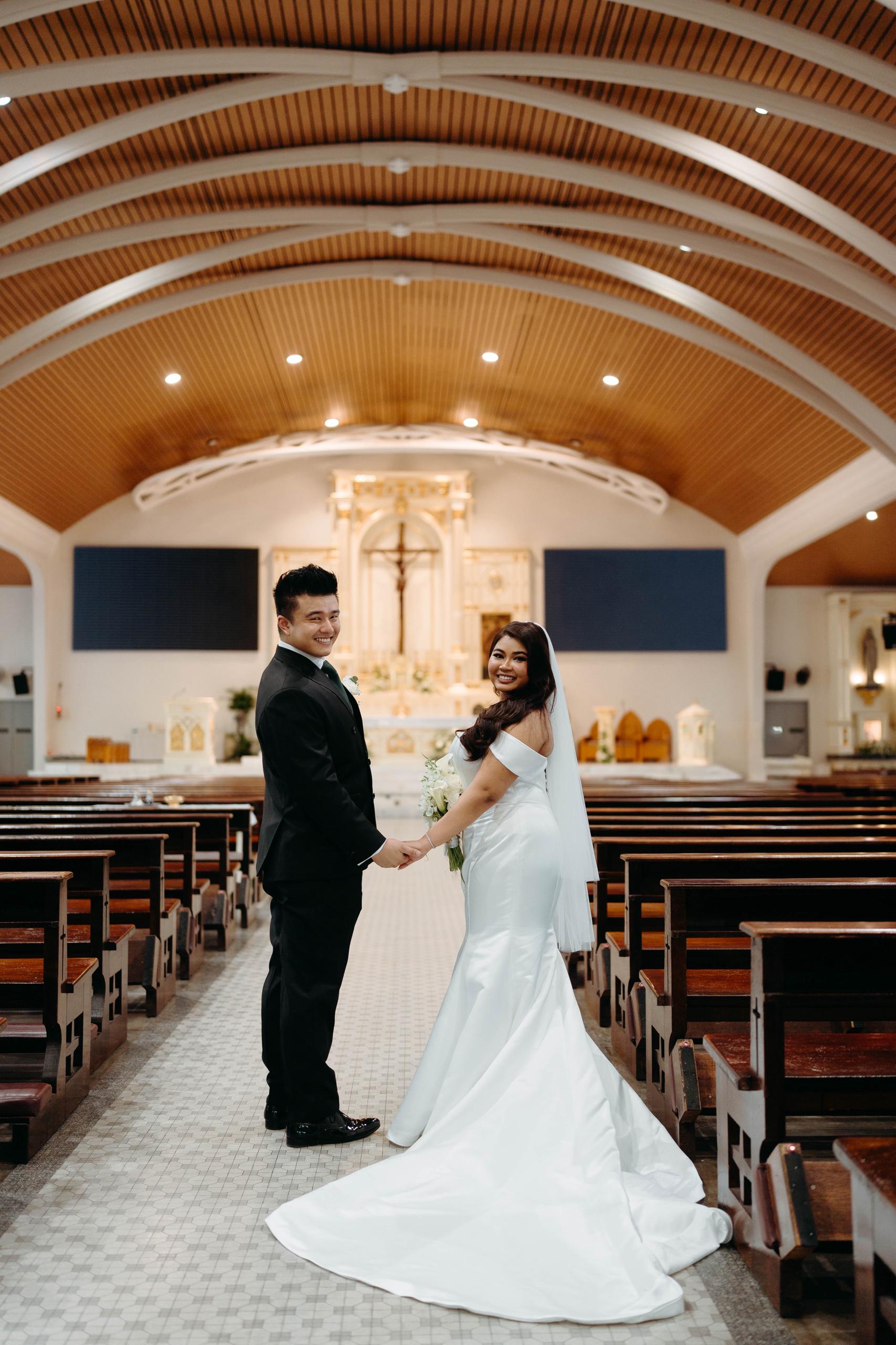 Custom wedding dress with figure-flattering corset bodice and fitted skirt
