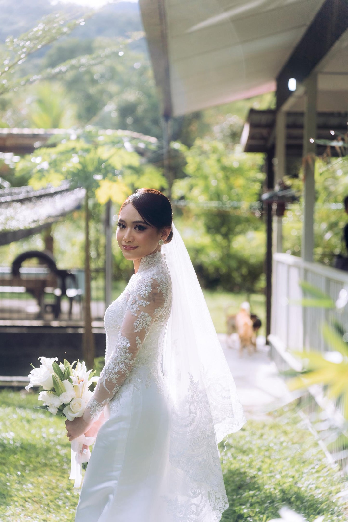 Bride Valerie’s Timeless Long-Sleeve Lace Gown