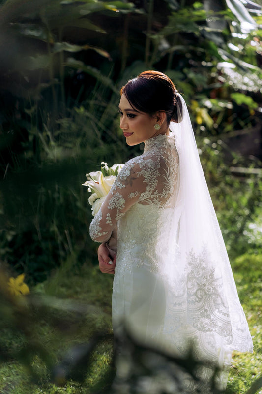 Bride Valerie’s Timeless Long-Sleeve Lace Gown