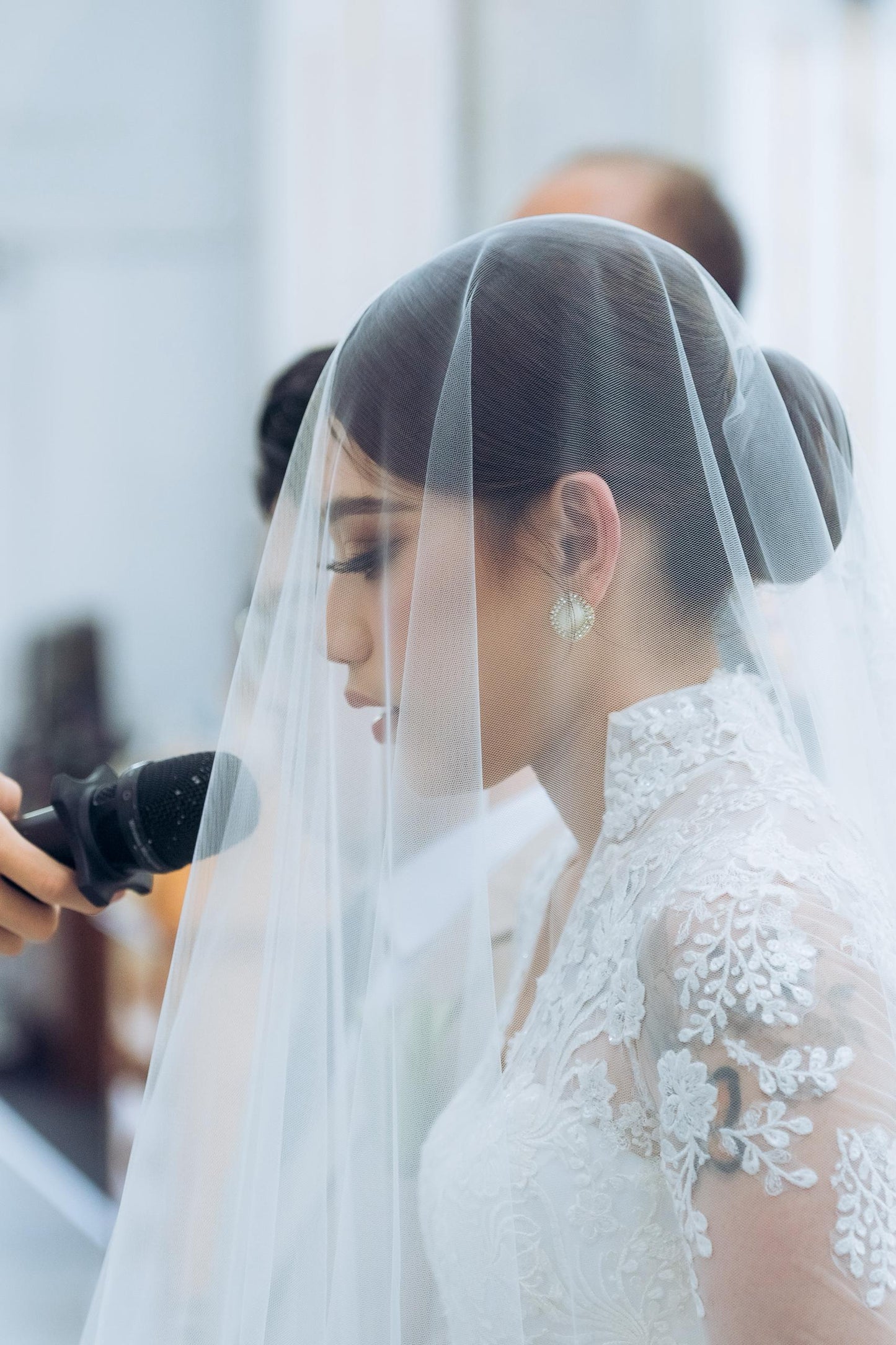 Bride Valerie’s Timeless Long-Sleeve Lace Gown
